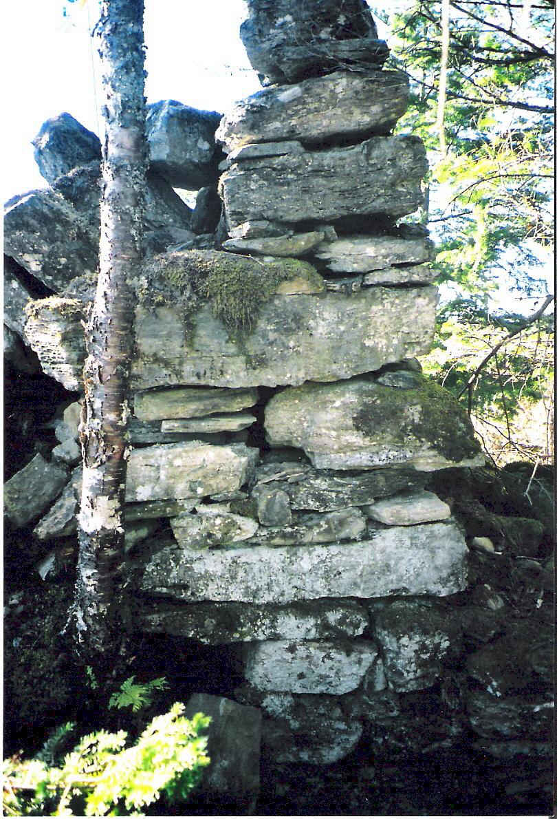 Remnant of a stone fireplace in New Ireland